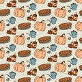 Seamless pattern of tea pot, pumpkin, candles and apple pie. Royalty Free Stock Photo